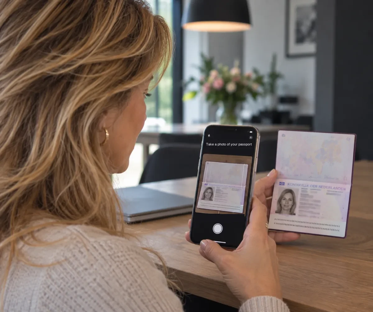 Woman takes a photo of her passport with her phone